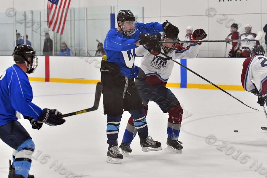 Wheaton College Men\'s Ice Hockey vs Middlesex Community College. - Photo By: KEITH NORDSTROM